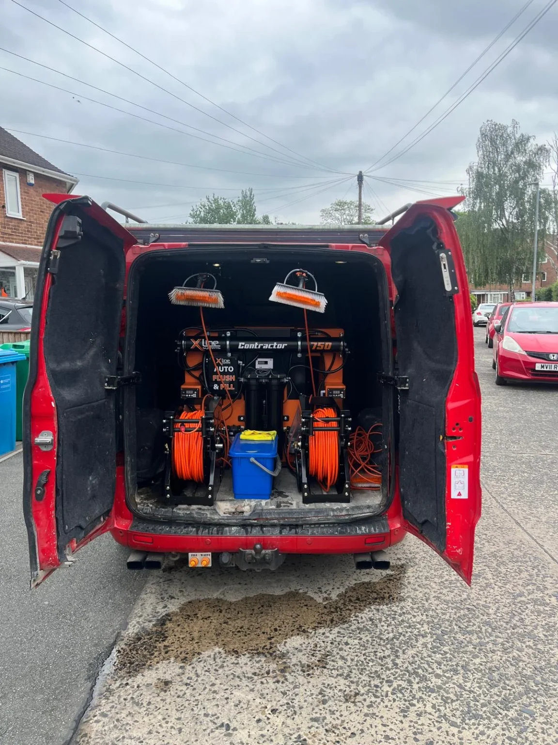 Omni Clean van with doors open showing the pure water window cleaning system
