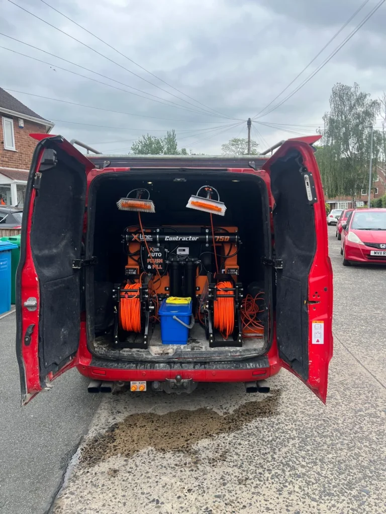 Omni Clean van with doors open showing the pure water window cleaning system