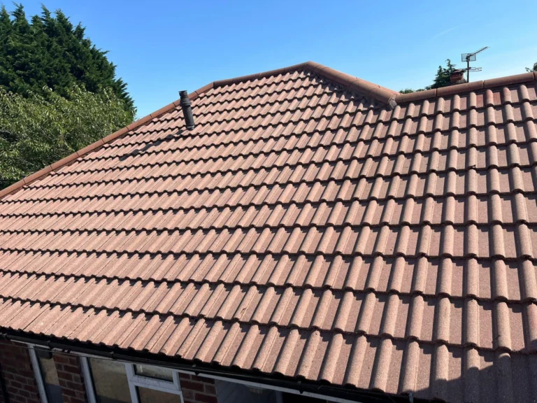 Clean concrete roof tiles after moss removal by Omni Clean in Manchester